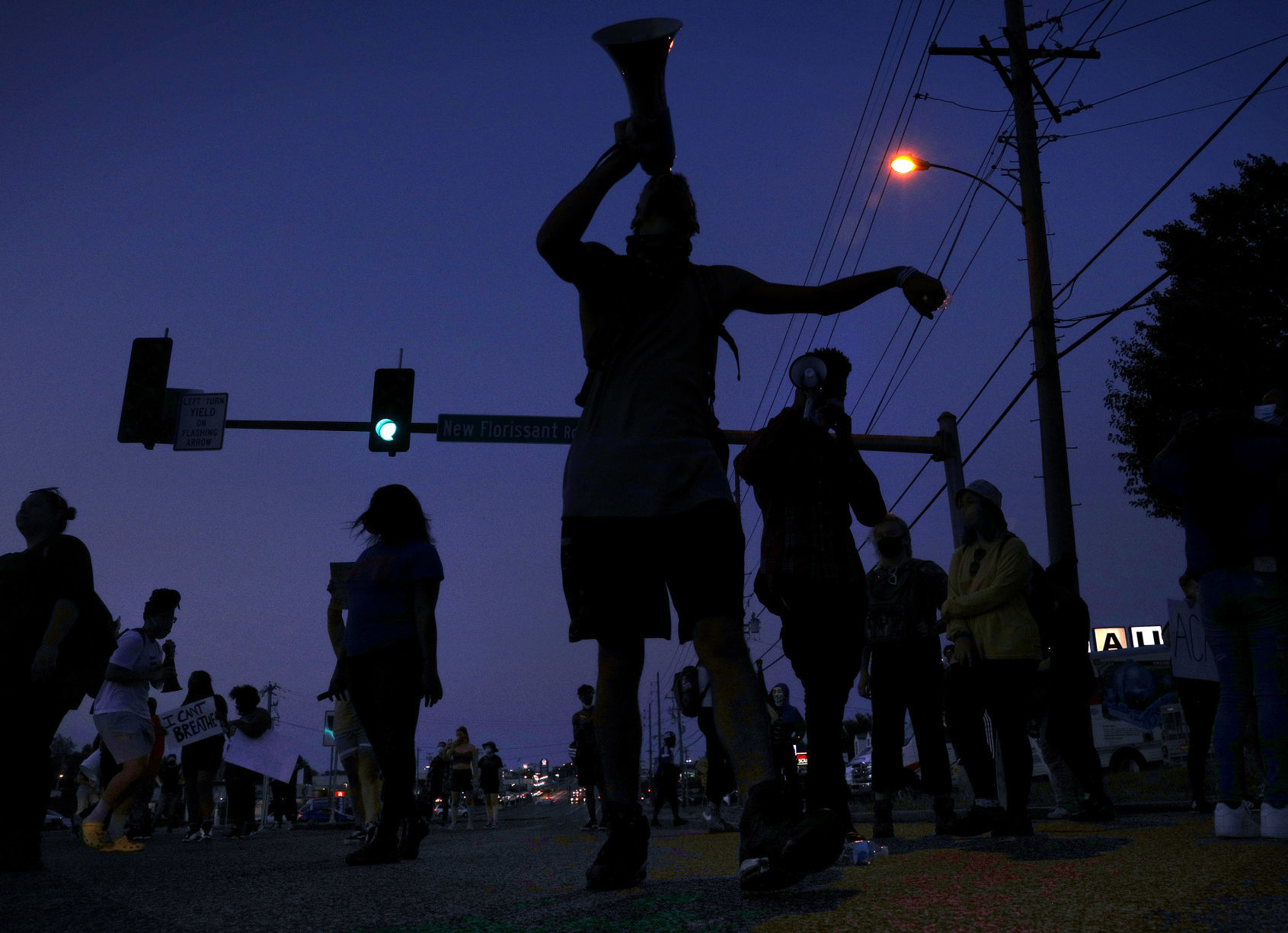 Protesters push for Florissant detective to be fired